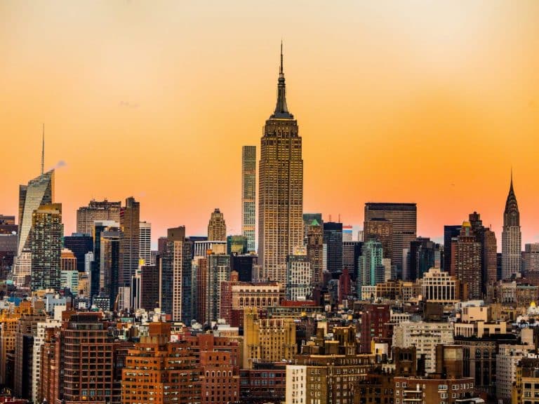 New York City skyline with Empire State Building center at sunset